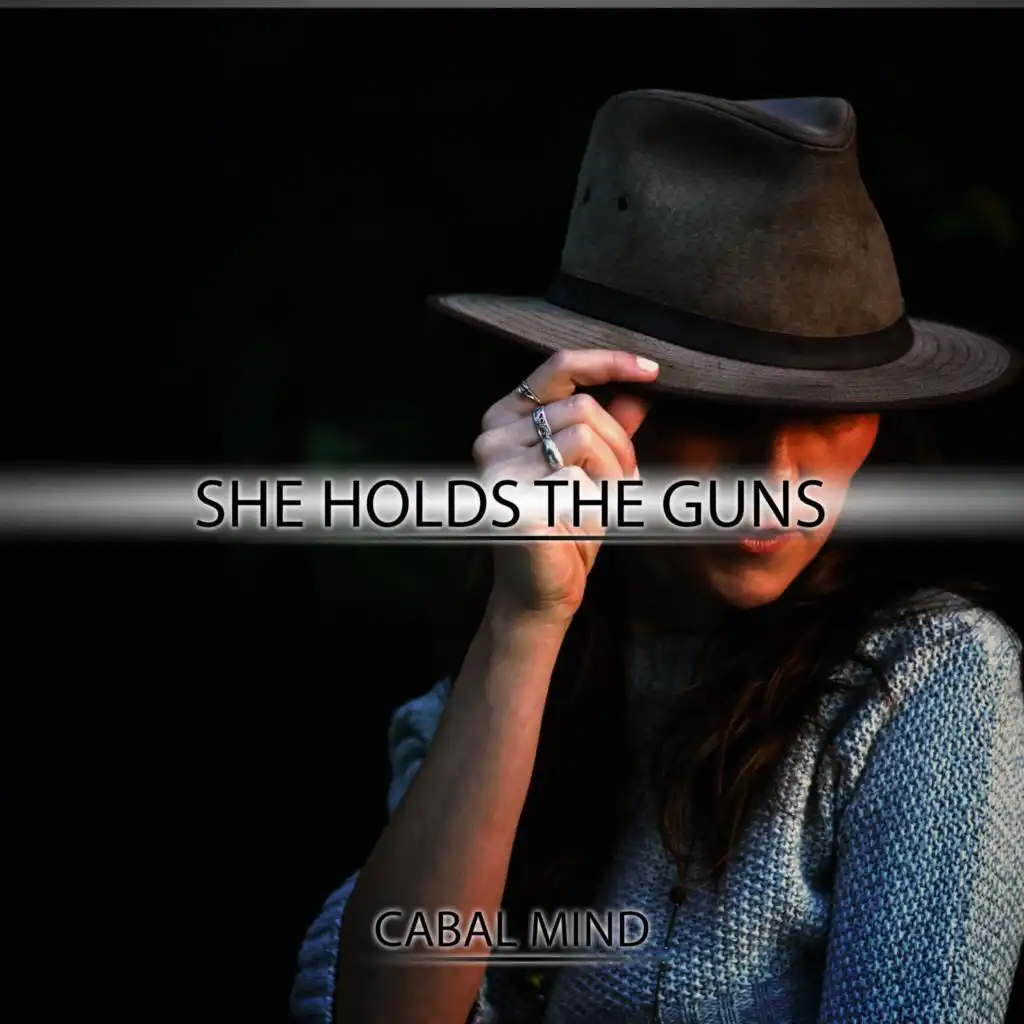 She Holds the Guns