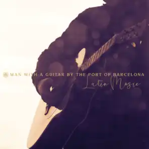 A Man with a Guitar By the Port of Barcelona - Latin Music