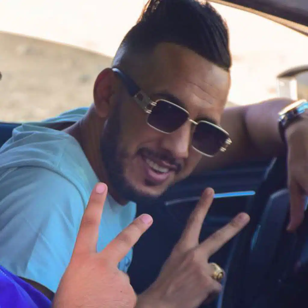 Li Tbghik Bsah 3la jalek Tbat Ga3da (feat. Amirovitch)