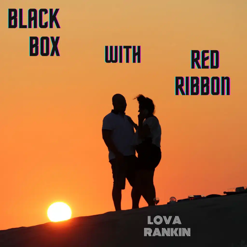 BLACK BOX WITH RED RIBBON