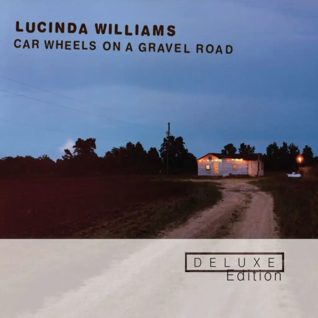 Car Wheels On A Gravel Road