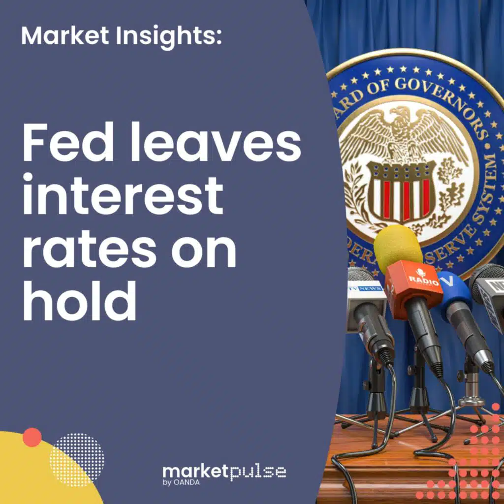 Fed holds rates