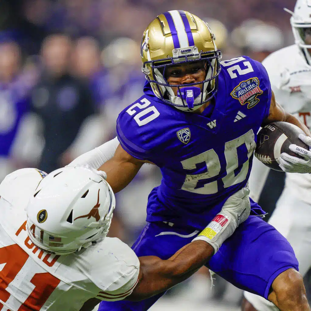 UW football player accused of raping two women pleads not guilty