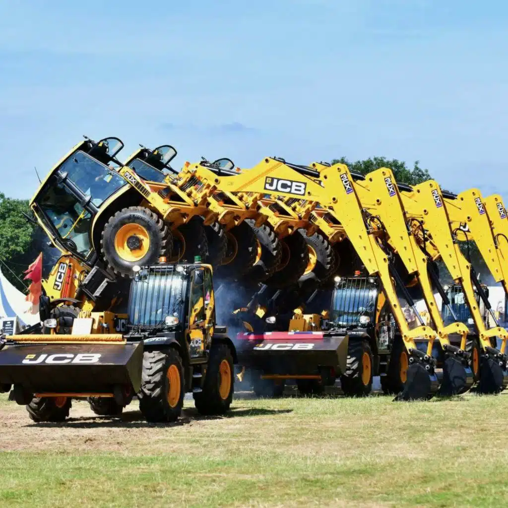 How this group use JCB diggers to dance