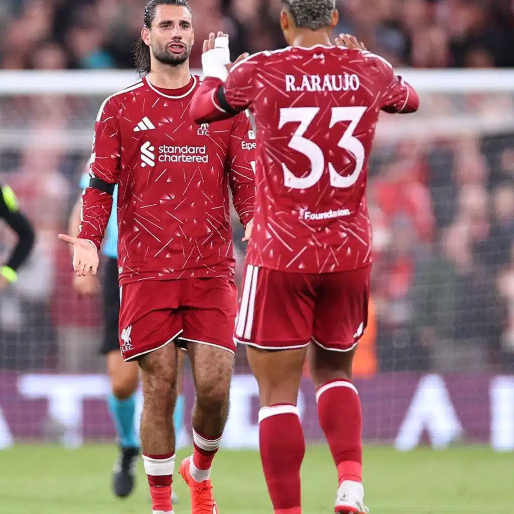 Liverpool edge Atlético as Barcelona, Paris and Arsenal make winning starts