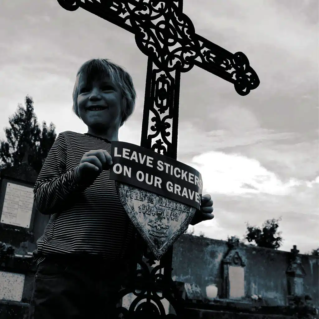 Leave Stickers on Our Graves