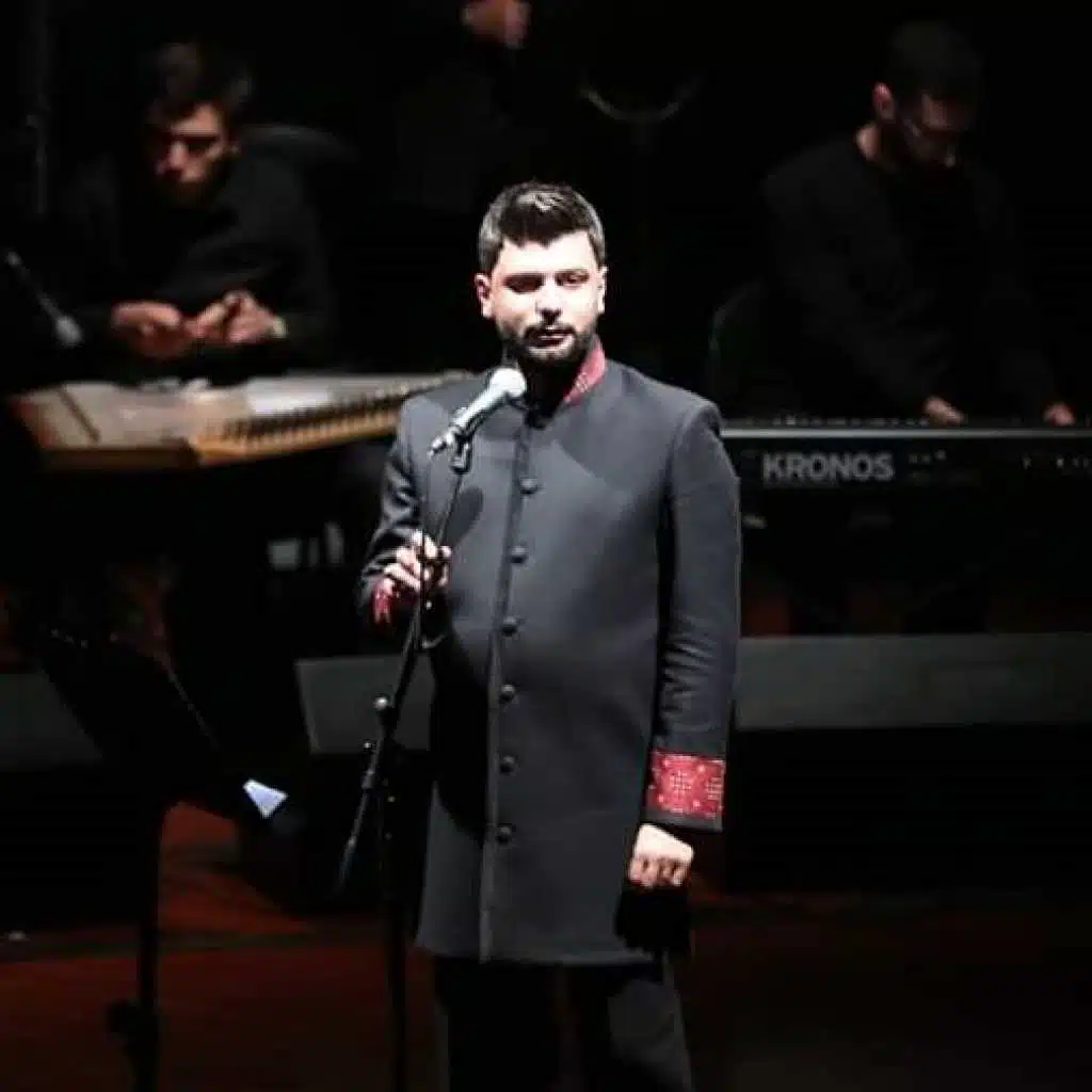 ألا يا أيها الساقي