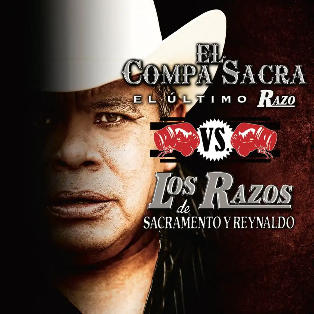 El Compa Sacra Vs. Los Razos