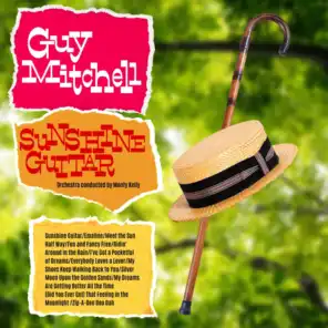 Guy Mitchell; Orchestra and Chorus under the direction of Mitch Miller